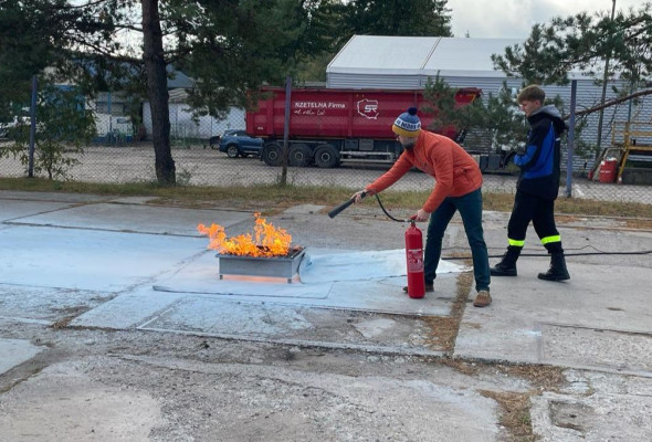 Training in using fire extinguishers and responding to fire threats